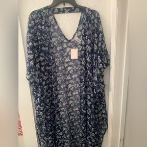 Women’s kimono cover up. Sheer floral print.